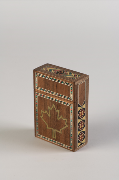 Woodbox made of high-quality wood with a Canadian maple leaf.